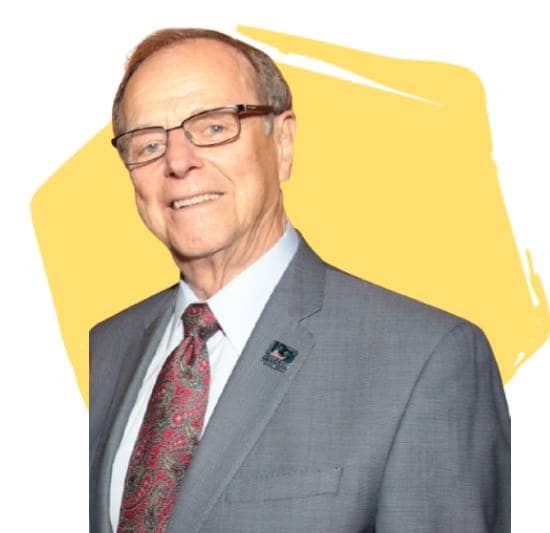 Alan Rothenberg, Founder and Lifetime Board Director, in front of a yellow hexagon.